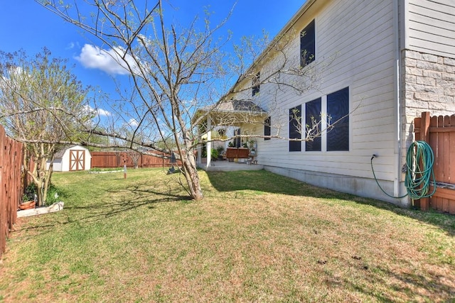 2435 Candle Ridge Trl, Georgetown, TX 78626 - view of yard with a fenced backyard, an outbuilding, and a storage unit