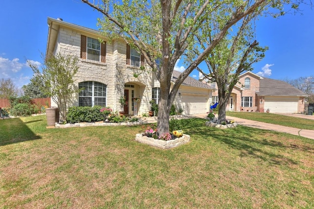 2435 Candle Ridge Trl, Georgetown, TX 78626 - view of front of home with a front lawn, stone siding, and a garage