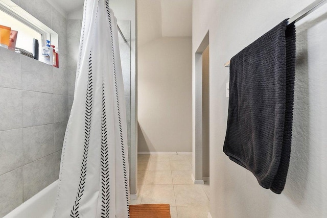 full bath with tile patterned flooring and shower / tub combo