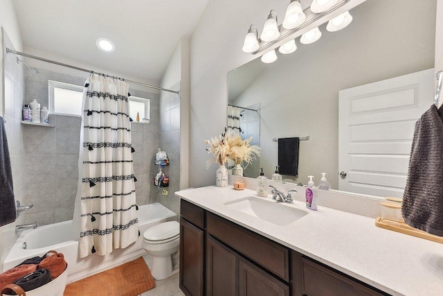 bathroom with vanity, toilet, and shower / tub combo