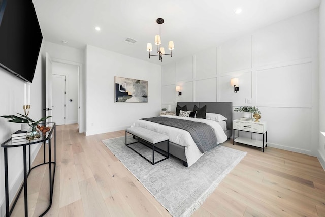 13408 Galleria Cir, Austin, TX 78738 - bedroom featuring a chandelier, light wood-style flooring, recessed lighting, and baseboards