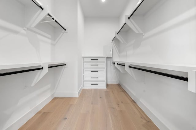 13408 Galleria Cir, Austin, TX 78738 - walk in closet featuring light wood finished floors