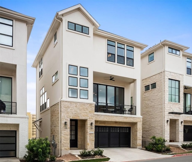 13408 Galleria Cir, Austin, TX 78738 - contemporary house with stucco siding, an attached garage, stone siding, and driveway