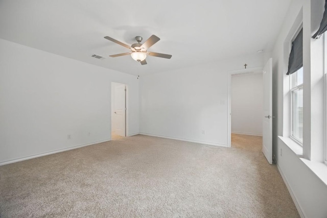 403 Stinchcomb Rd, Hutto, TX 78634 - spare room featuring light carpet and ceiling fan
