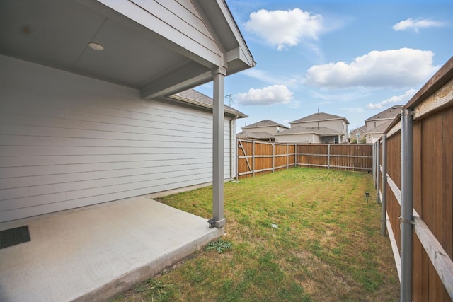 403 Stinchcomb Rd, Hutto, TX 78634 - fenced backyard featuring a patio area