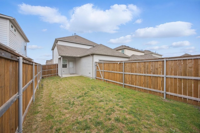 403 Stinchcomb Rd, Hutto, TX 78634 - back of house featuring a fenced backyard