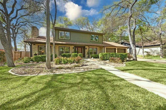view of front of property with a chimney, an attached garage, brick siding, and concrete driveway