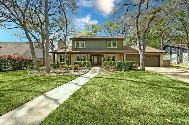 traditional-style home featuring a garage, driveway, a front lawn, and a chimney