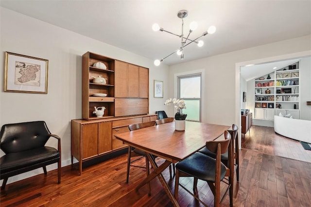 dining room with a chandelier and dark wood-type flooring