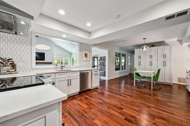 kitchen with dishwasher, light countertops, hanging light fixtures, dark wood-style floors, and white cabinetry