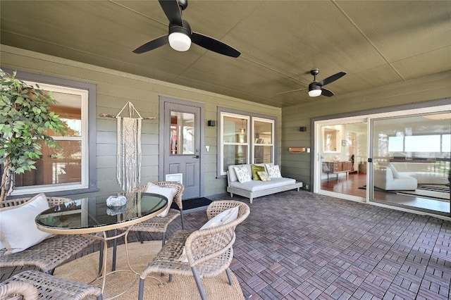 view of patio featuring a ceiling fan