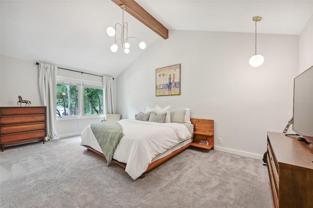 carpeted bedroom with a chandelier and baseboards