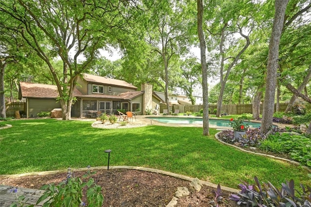 back of property featuring a sunroom