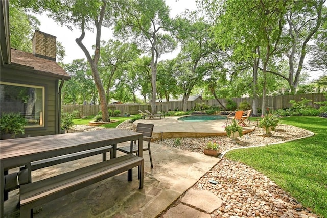 view of patio featuring a fenced backyard