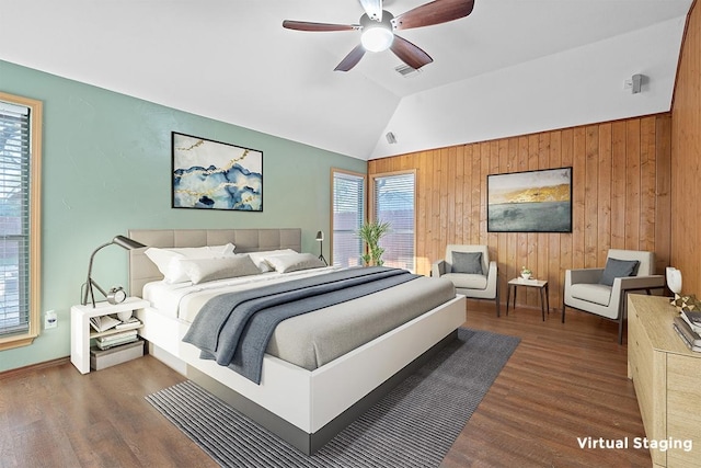 15835 Garrison Cir, Austin, TX 78717 - bedroom featuring wooden walls, wood finished floors, lofted ceiling, baseboards, and ceiling fan