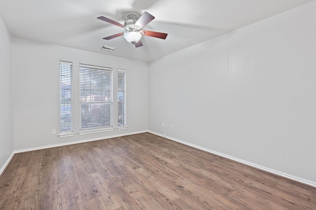 15835 Garrison Cir, Austin, TX 78717 - spare room with baseboards, wood finished floors, and ceiling fan
