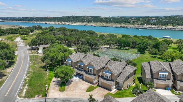 aerial view with a water view and a residential view