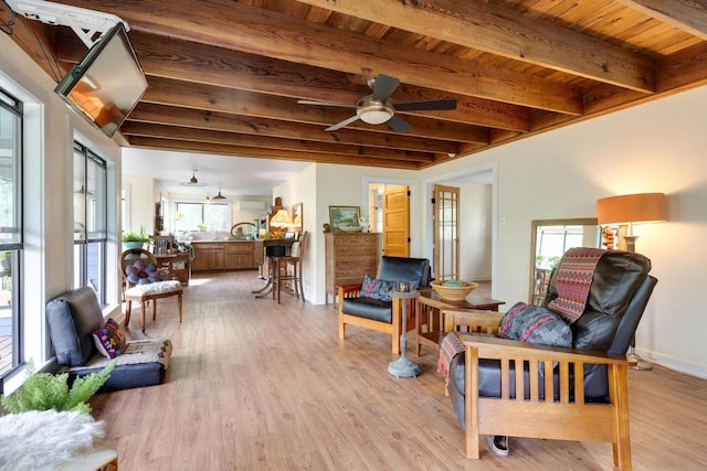 sunroom with beamed ceiling