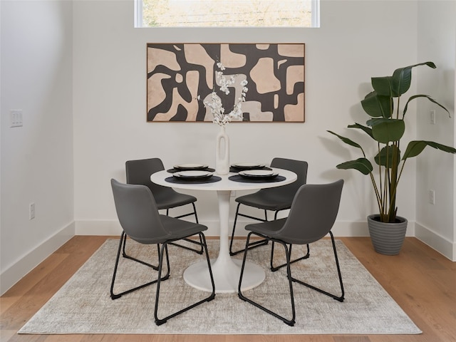 7516 Northcrest Blvd Unit B, Austin, TX 78752 - dining area featuring baseboards and wood finished floors