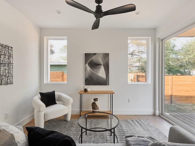 7516 Northcrest Blvd Unit B, Austin, TX 78752 - sitting room with ceiling fan, baseboards, wood finished floors, and recessed lighting