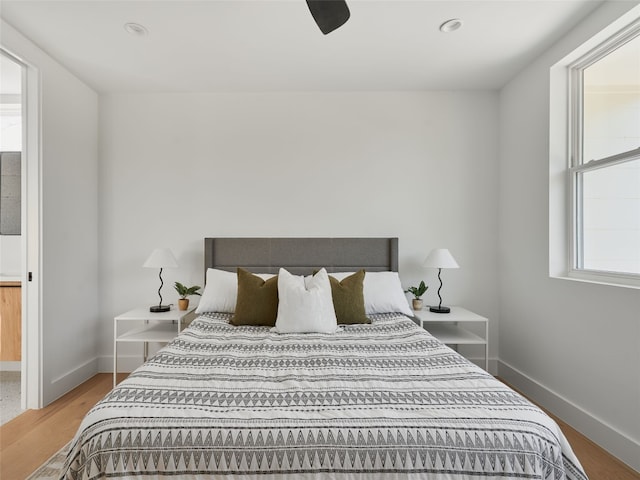 7516 Northcrest Blvd Unit B, Austin, TX 78752 - bedroom featuring wood finished floors, baseboards, a ceiling fan, and recessed lighting