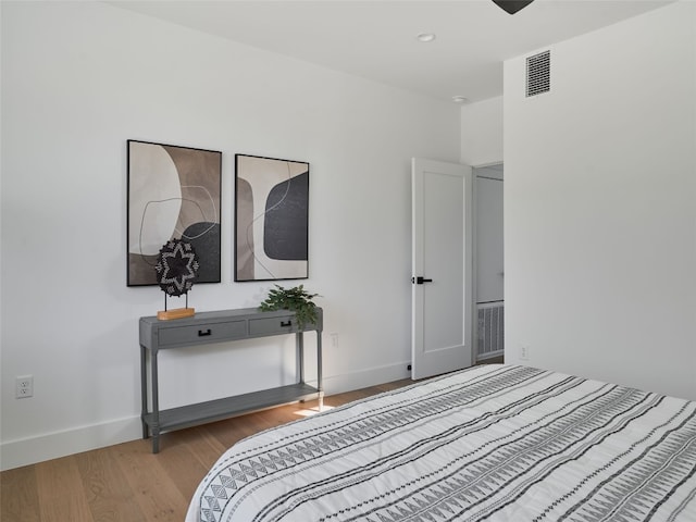7516 Northcrest Blvd Unit B, Austin, TX 78752 - bedroom featuring wood finished floors and baseboards