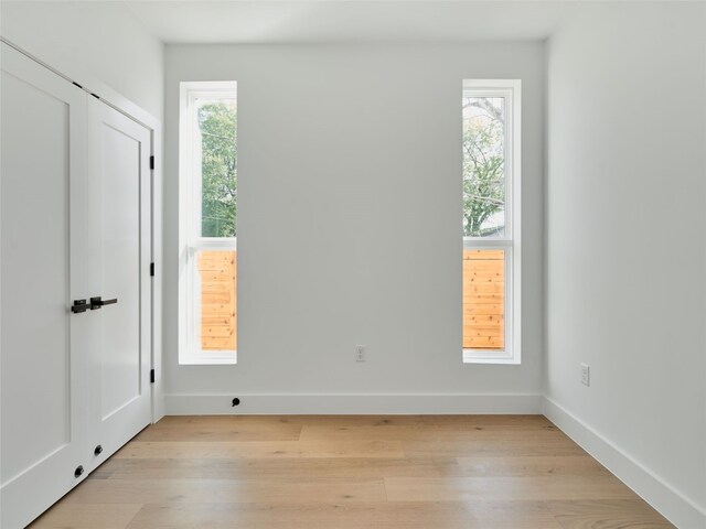 7516 Northcrest Blvd Unit B, Austin, TX 78752 - unfurnished room featuring light wood-style floors and baseboards