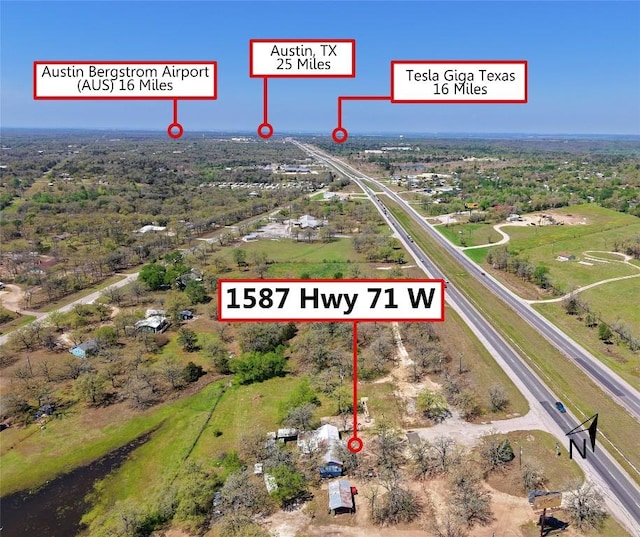 1587 State Highway 71 W Unit A, Cedar Creek, TX 78612 - aerial overview of property's location featuring a main thoroughfare