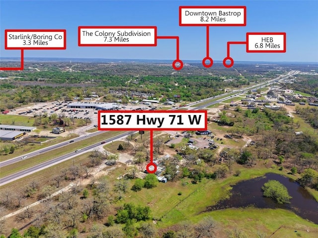 1587 State Highway 71 W Unit A, Cedar Creek, TX 78612 - drone / aerial view of a large body of water