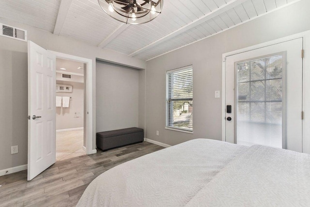 7067 Comanche Trl, Austin, TX 78732 - bedroom featuring wood finished floors, baseboards, and wood ceiling