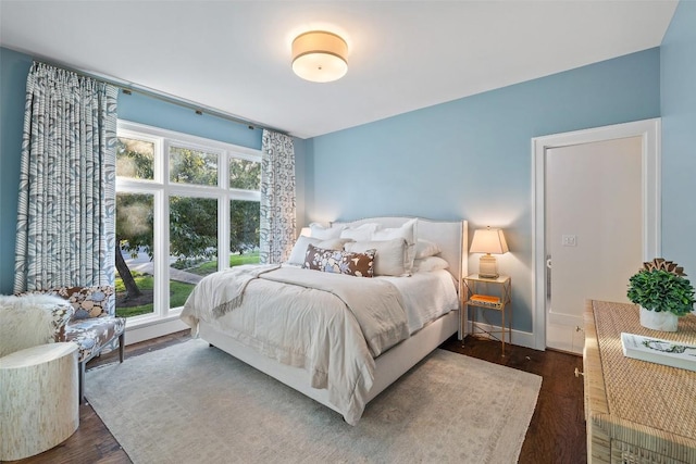 1106 Blackacre Trl, West Lake Hills, TX 78746 - bedroom featuring baseboards and dark wood-style flooring