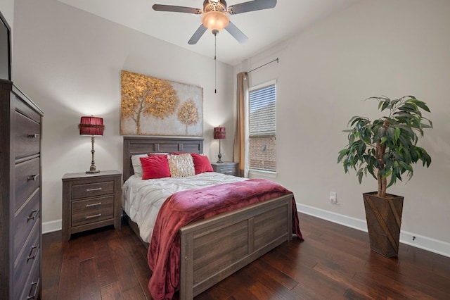 2429 Carretera Dr, Leander, TX 78641 - bedroom with baseboards, dark wood-style floors, and a ceiling fan