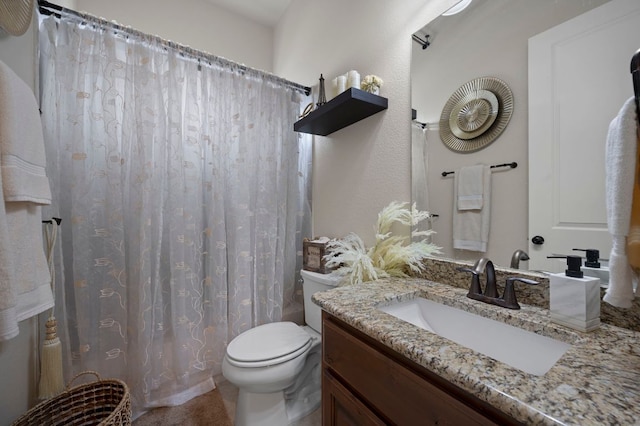 2429 Carretera Dr, Leander, TX 78641 - bathroom featuring vanity, toilet, and a shower with shower curtain