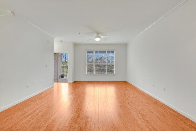 11203 Ranch Road 2222 205, Austin, TX 78730 - spare room with ornamental molding, ceiling fan, baseboards, and light wood-style floors