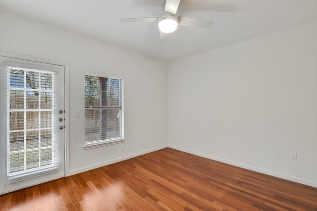 11203 Ranch Road 2222 205, Austin, TX 78730 - unfurnished room featuring wood finished floors, baseboards, and a ceiling fan