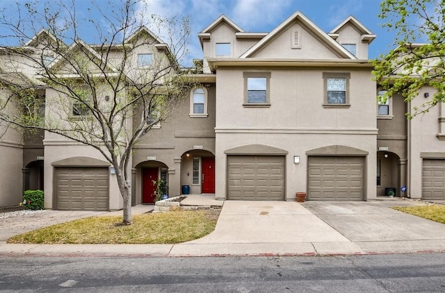 11203 Ranch Road 2222 205, Austin, TX 78730 - view of property featuring stucco siding and driveway