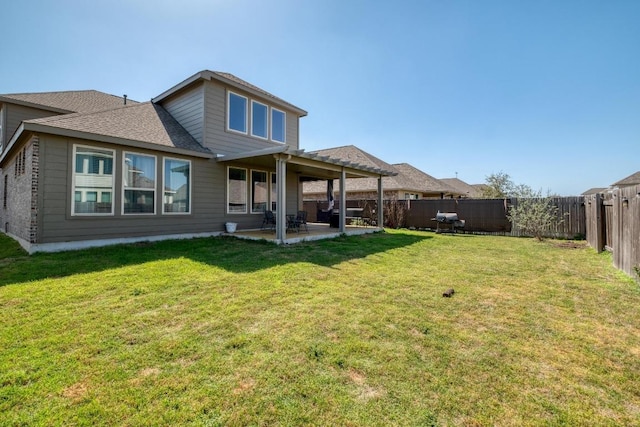 4108 Gildas Path, Pflugerville, TX 78660 - rear view of property featuring a patio and roof with shingles