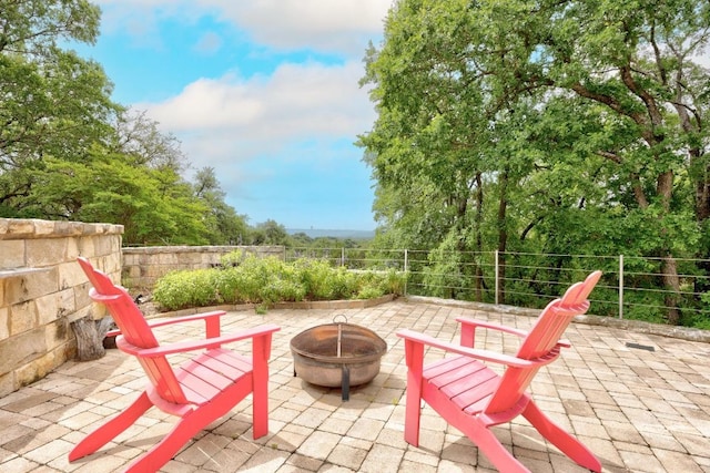 329 Park Place Dr, Georgetown, TX 78628 - view of patio with an outdoor fire pit