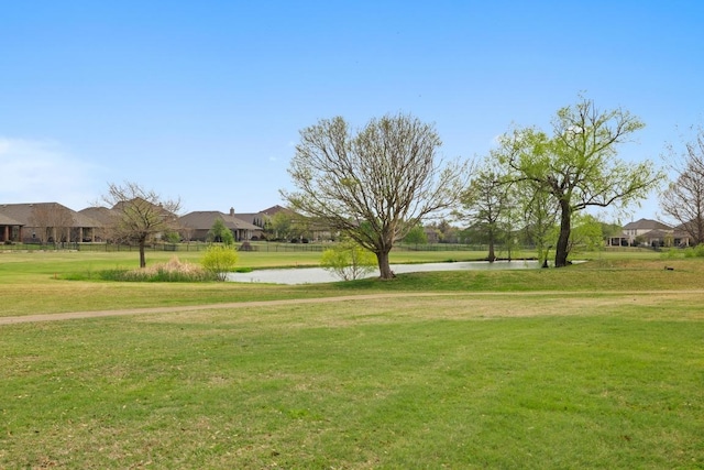 30224 Briarcrest Dr, Georgetown, TX 78628 - surrounding community with a lawn and a water view
