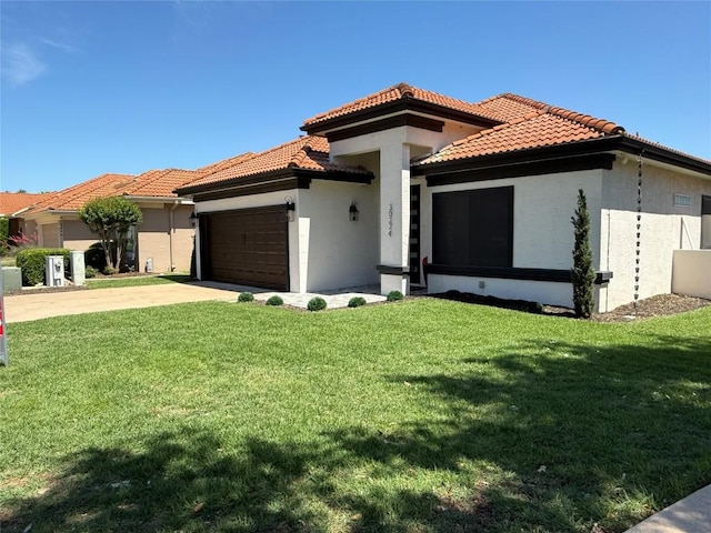 30224 Briarcrest Dr, Georgetown, TX 78628 - mediterranean / spanish-style home with a tile roof, a front yard, and a garage