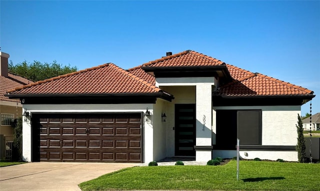30224 Briarcrest Dr, Georgetown, TX 78628 - mediterranean / spanish-style home featuring a front lawn, stucco siding, a tiled roof, an attached garage, and driveway