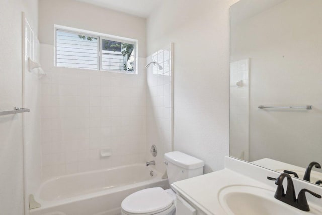 bathroom with toilet, vanity, and shower / bath combination