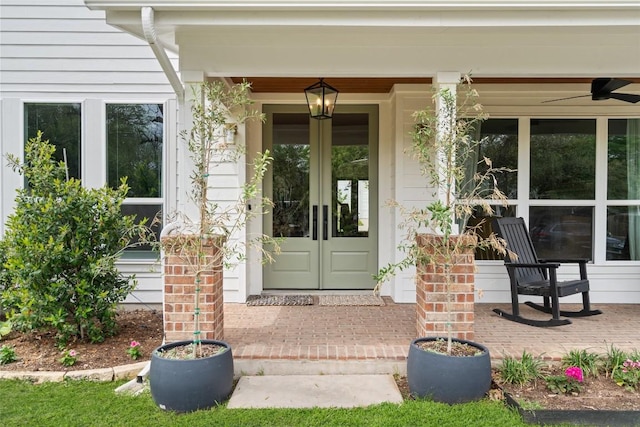 property entrance featuring french doors and covered porch