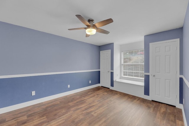 20912 High Dr, Lago Vista, TX 78645 - unfurnished room with wood finished floors, ceiling fan, and baseboards