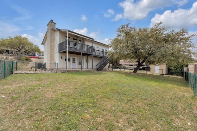 20912 High Dr, Lago Vista, TX 78645 - back of house with ceiling fan, a chimney, stairway, and a wooden deck