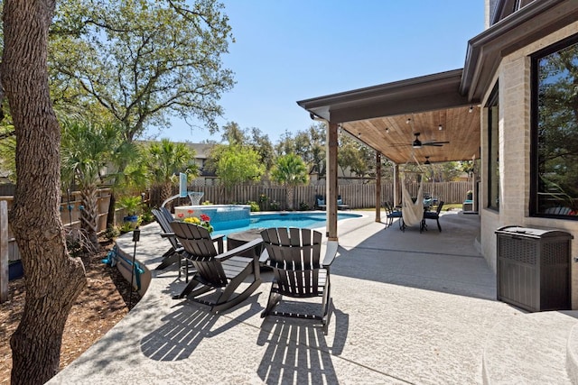 502 Explorer, Lakeway, TX 78734 - fenced backyard featuring ceiling fan and a patio area