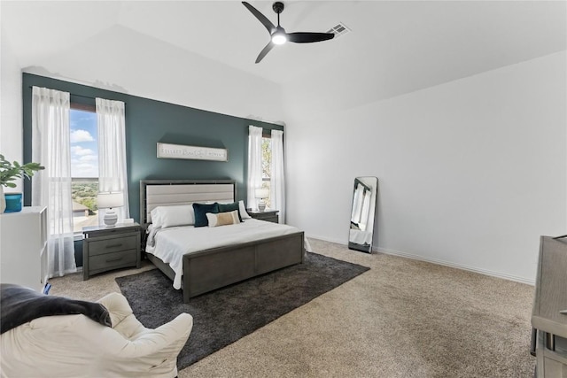 22300 Verbena Pkwy, Spicewood, TX 78669 - bedroom with lofted ceiling, multiple windows, light carpet, and a ceiling fan