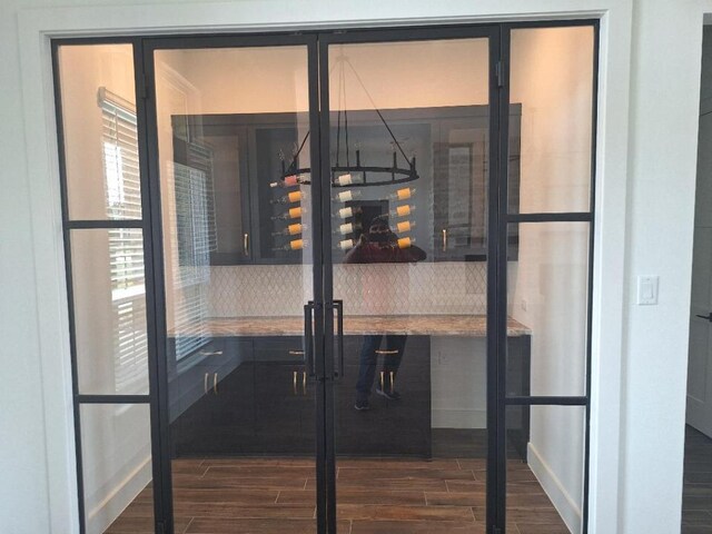 120 NW Strada Luca NW, Florence, TX 76527 - wine room featuring dark wood-style flooring