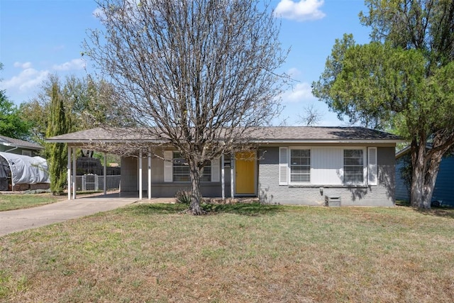 1410 Yorkshire Dr, Austin, TX 78723 - ranch-style house featuring an attached carport and concrete driveway