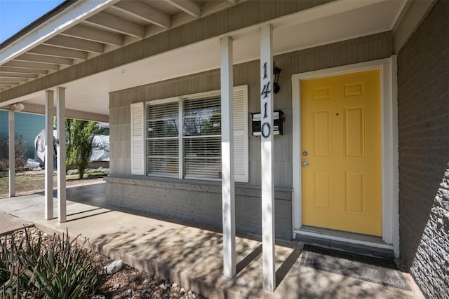 1410 Yorkshire Dr, Austin, TX 78723 - property entrance with a porch